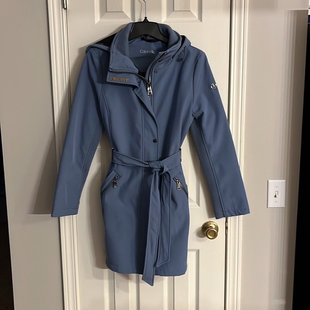 NWOT - Lined Calvin Klein rain jacket with hood.